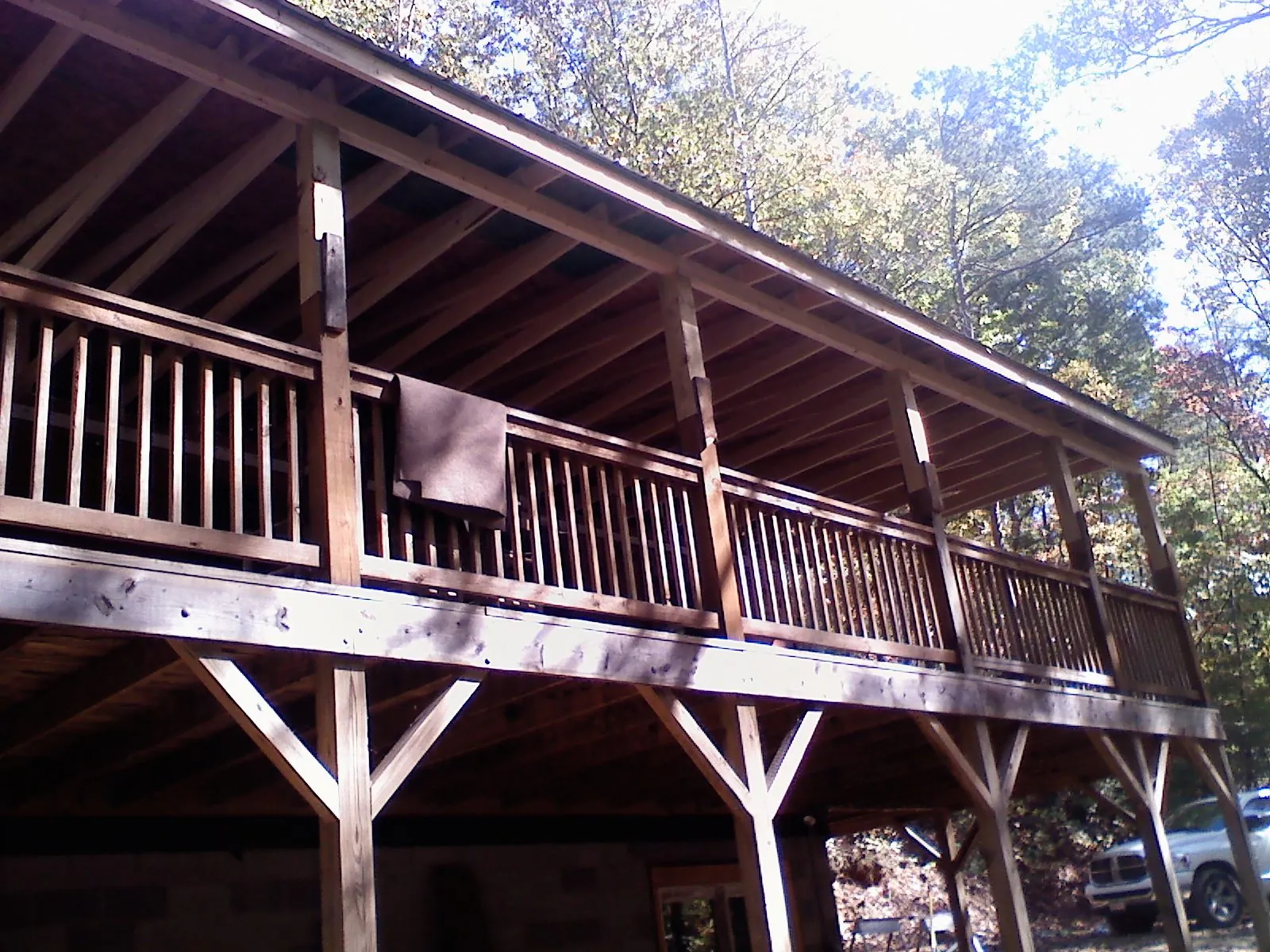 Timber framing under a new elevated porch and deck — Roof Leak Repair in Ovid by Roofing Brothers